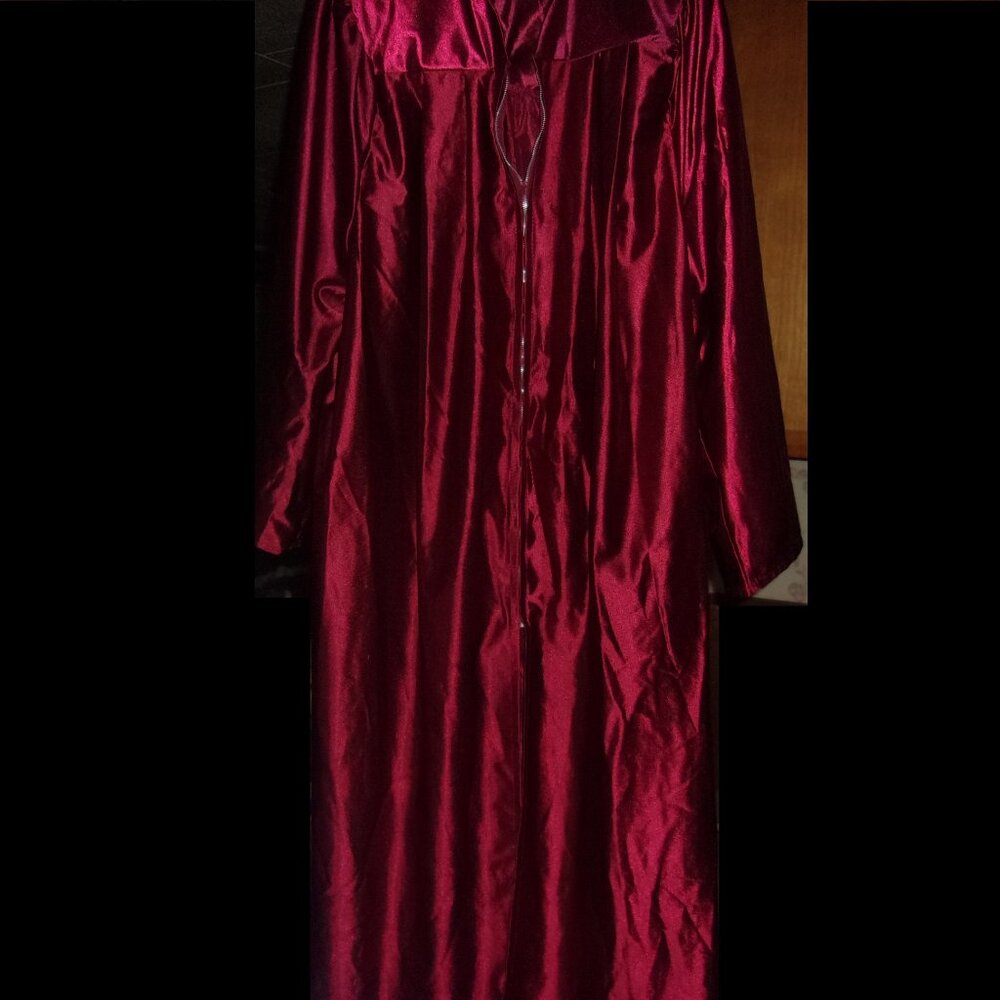 RED GRADUATION CAP AND GOWN